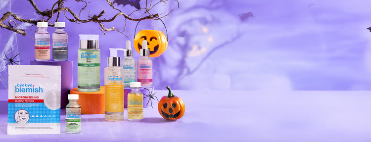 Bye Bye Blemish products with Halloween-themed decorations on a purple background