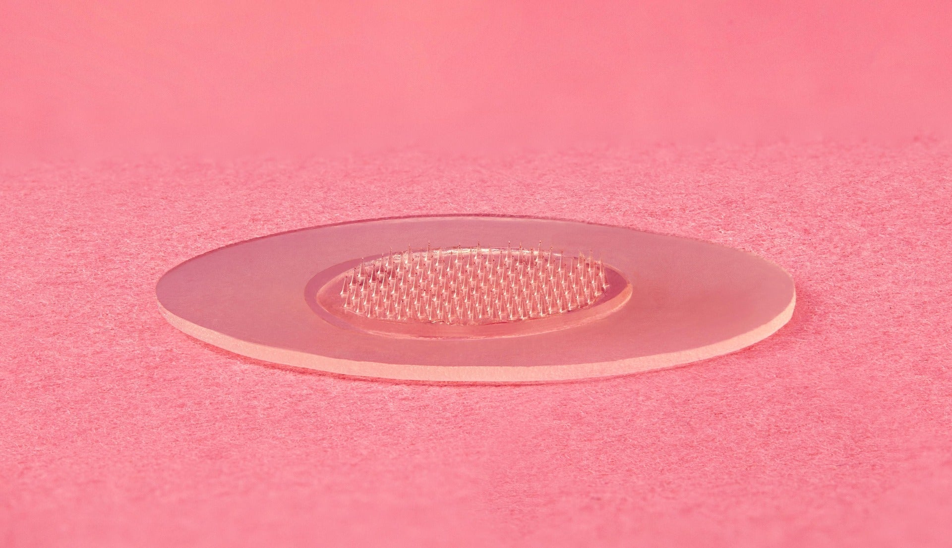 Detailed view of a Bye Bye Blemish microneedling patch with tiny micro-points for targeted acne treatment.