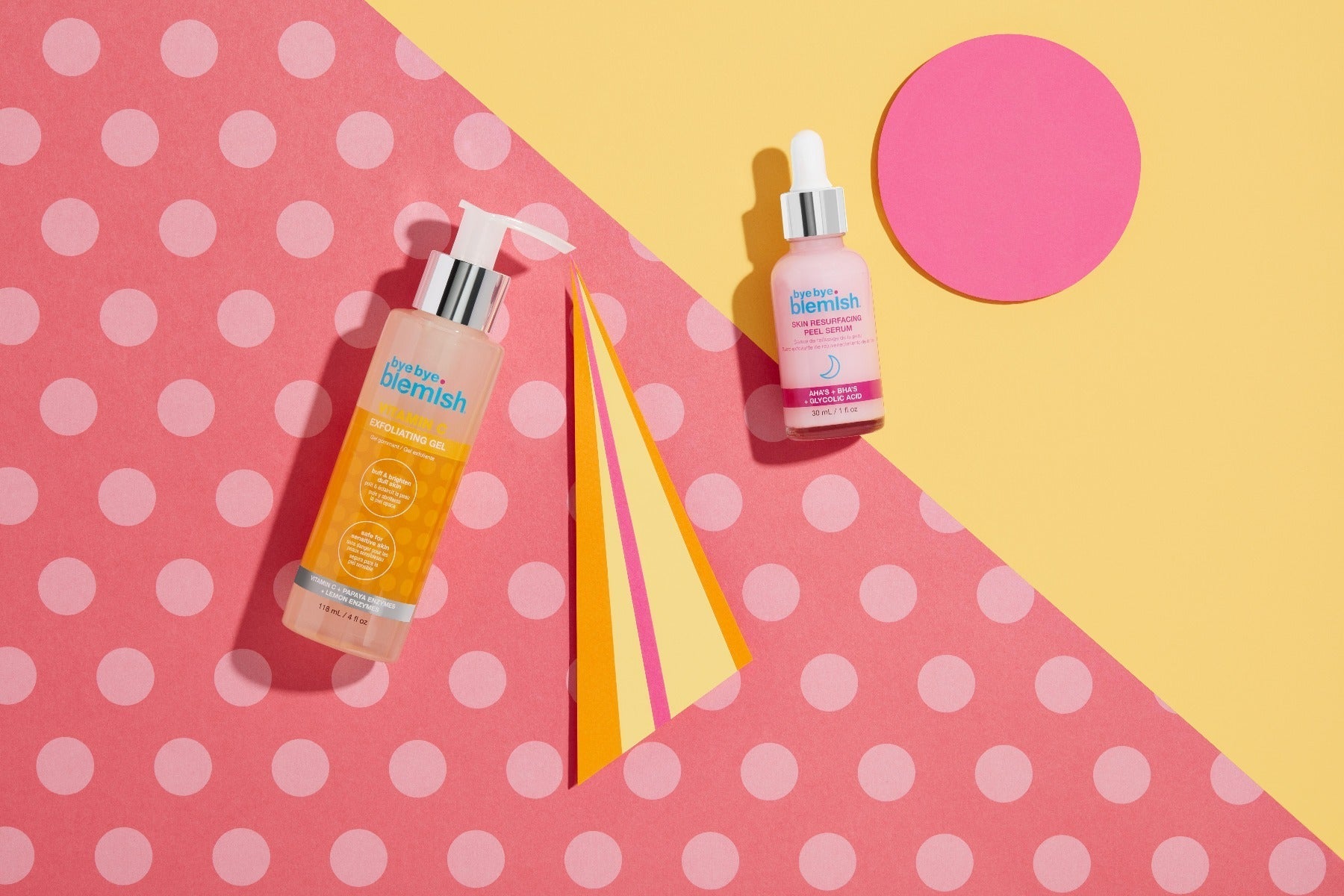 Skin Resurfacing Peel Serum bottle next to Vitamin C bottle