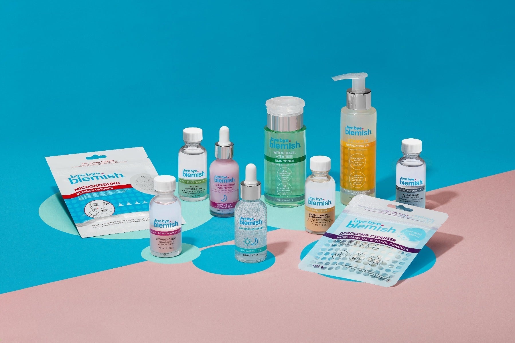 Full range of Bye Bye Blemish skincare products, featuring exfoliators, serums, and acne treatments.