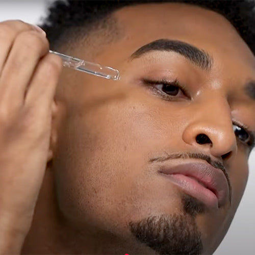 Man applying serum with dropper – Skincare serum application on face with dropper for hydration and glow.