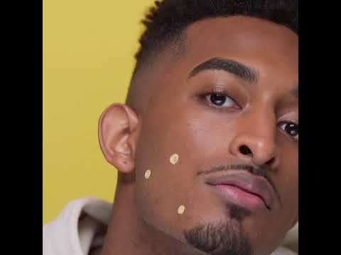 Man using acne concealer dots – Acne treatment concealer dots for even skin tone and blemish coverage.