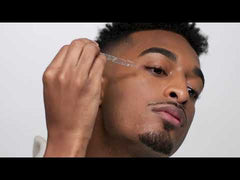 Man applying serum with dropper – Skincare serum application on face with dropper for hydration and glow.